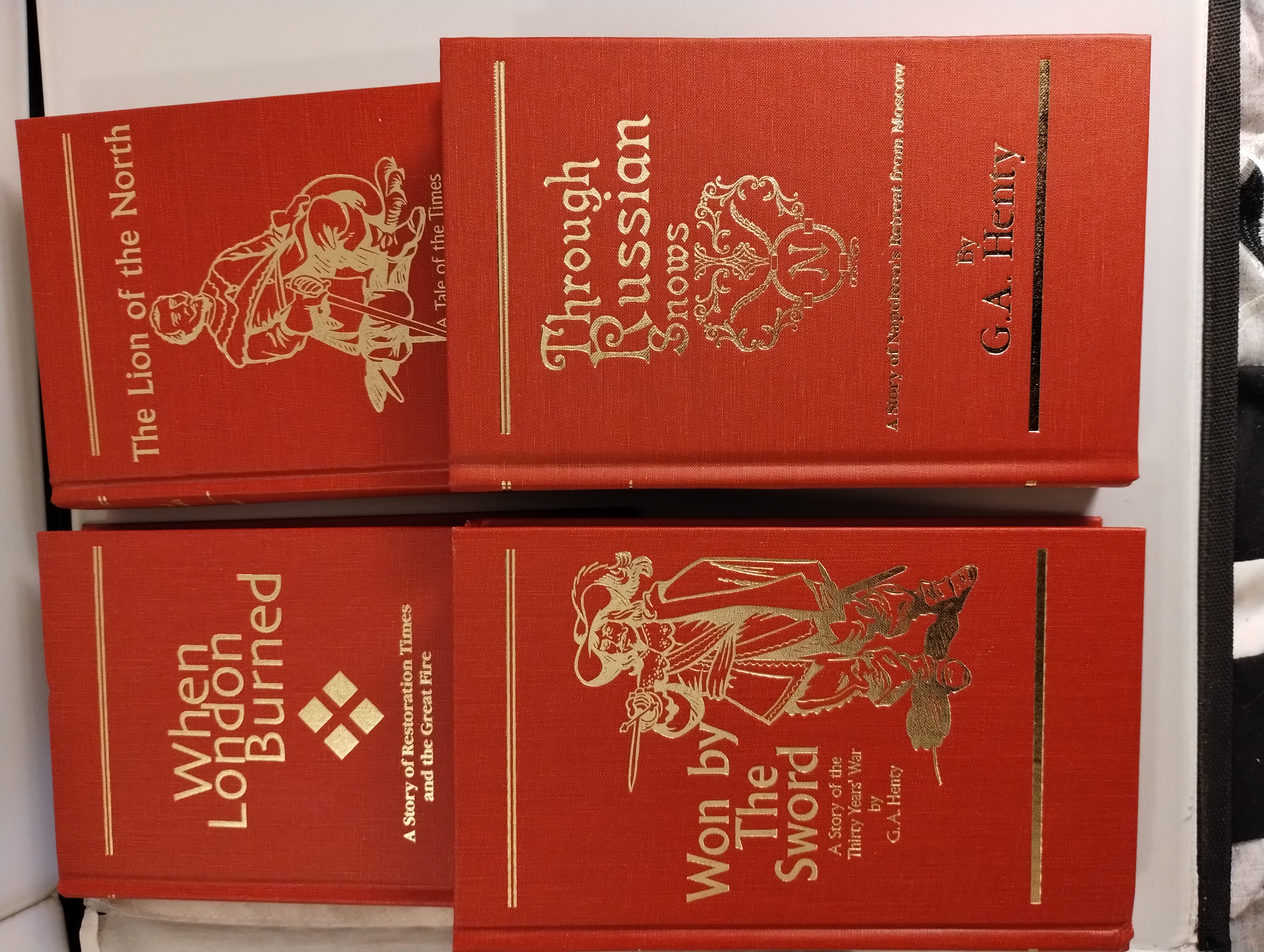 WHEN LONDON BURNED , THROUGH RUSSIAN SNOWS , WON BY THE SWORD , THE LION OF THE NORTH [ FOUR G.A. HENTY NOVELS ]