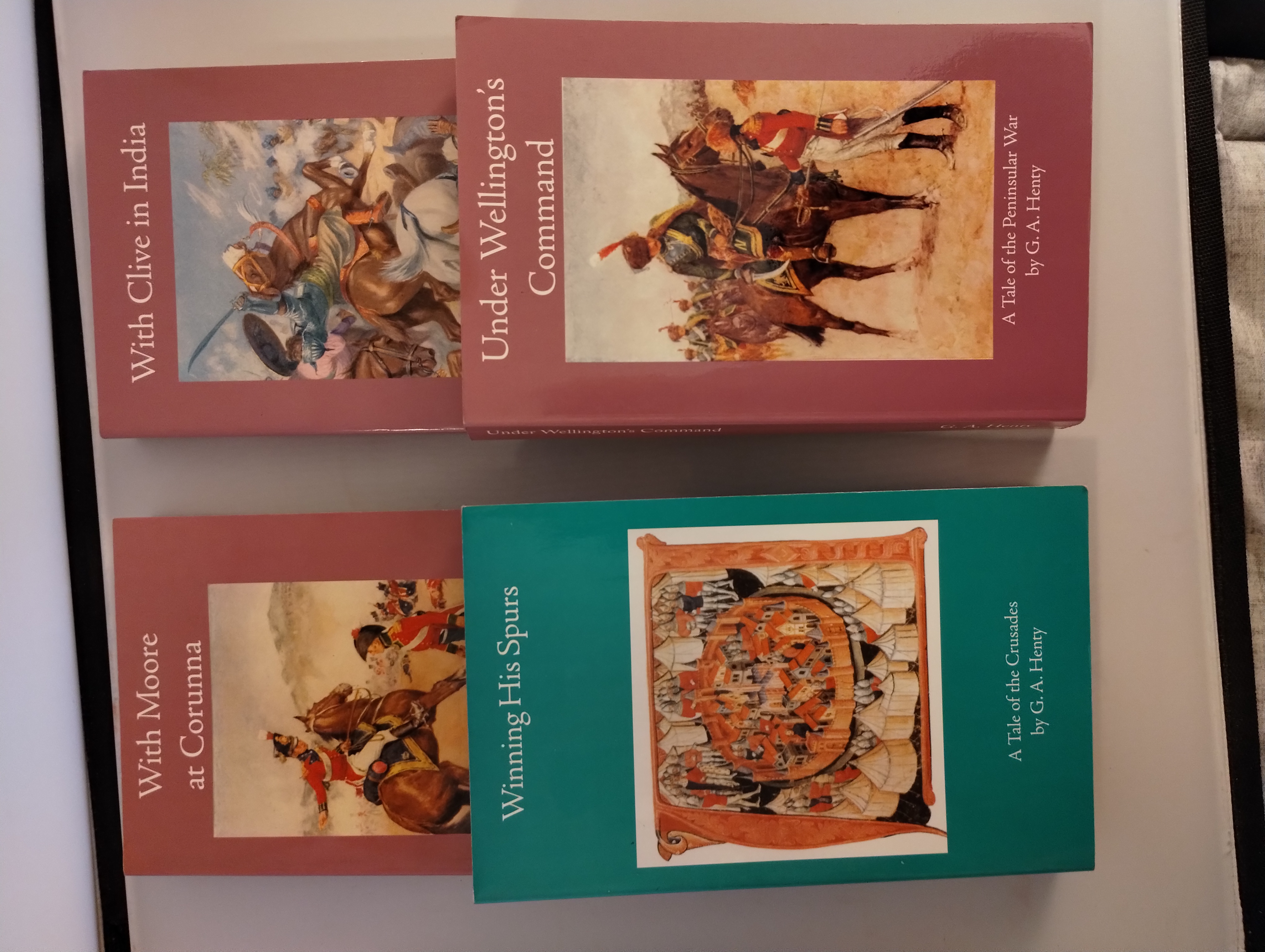 WINNING HIS SPURS , WITH CLIVE IN INDIA , WITH MOORE AT CORUNNA , UNDER WELLINGTON'S COMMAND [ 4 SOFT COVER G.A. HENTY REPRINTS ]