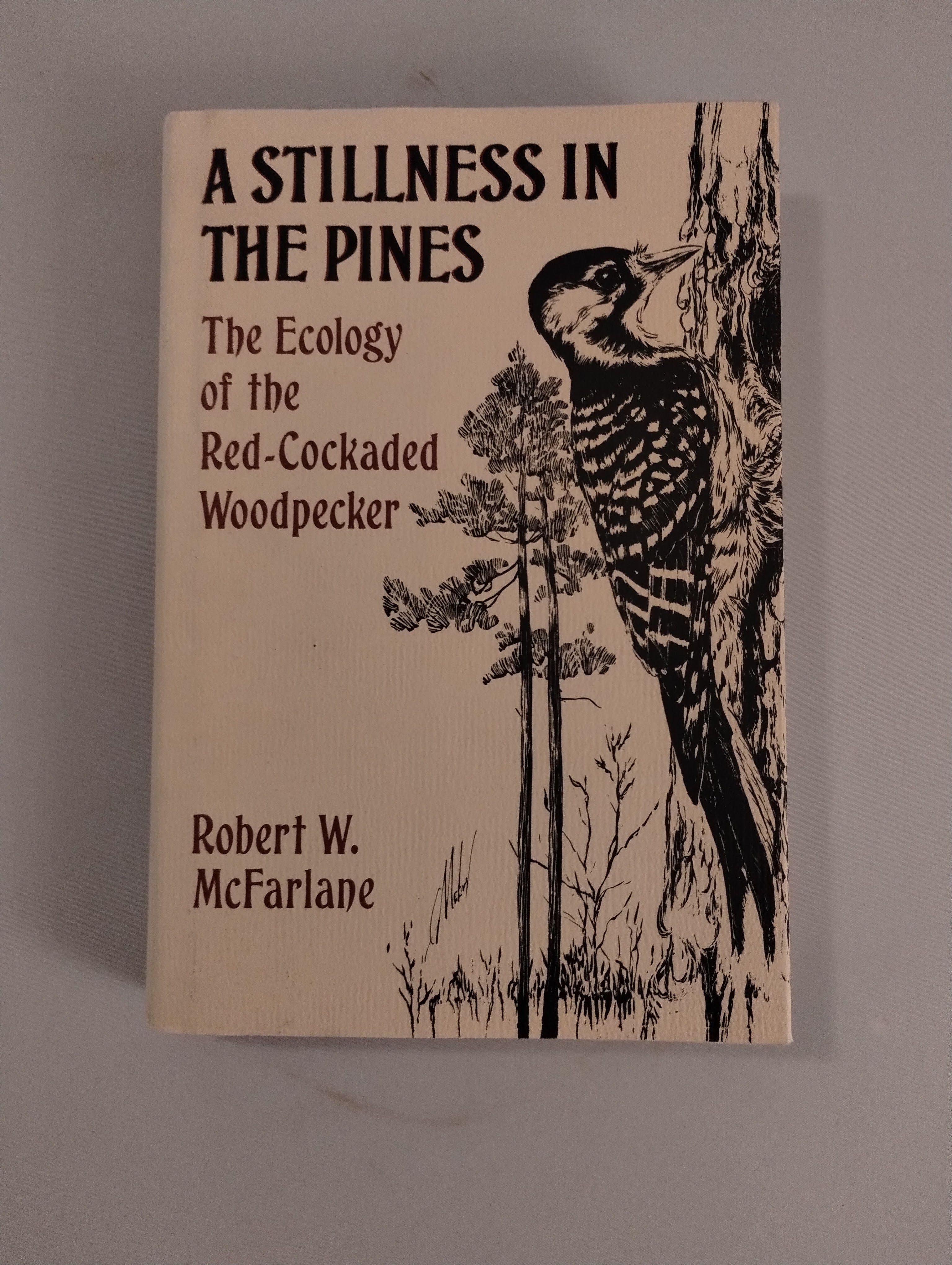 A STILLNES IN THE PINES THE ECOLOGY OF THE RED - COCADED WOODPECKER